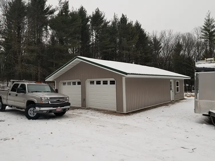 | Troyer Roofing and Construction siding-exterior-snow-garage