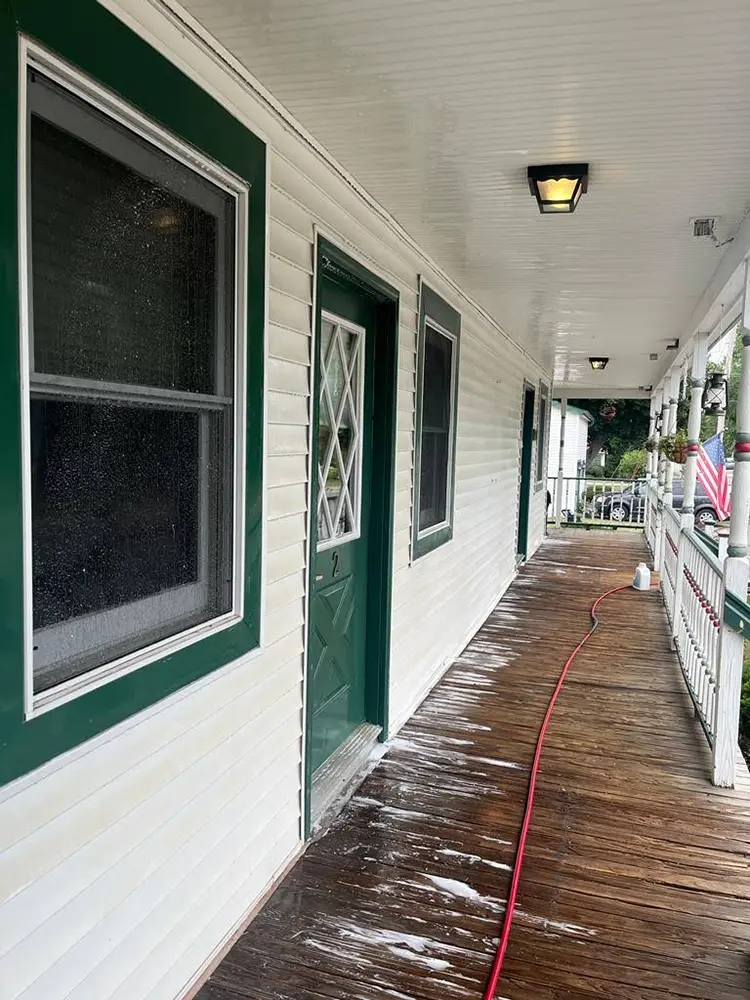 siding-porch-cleaning | Troyer Roofing and Construction